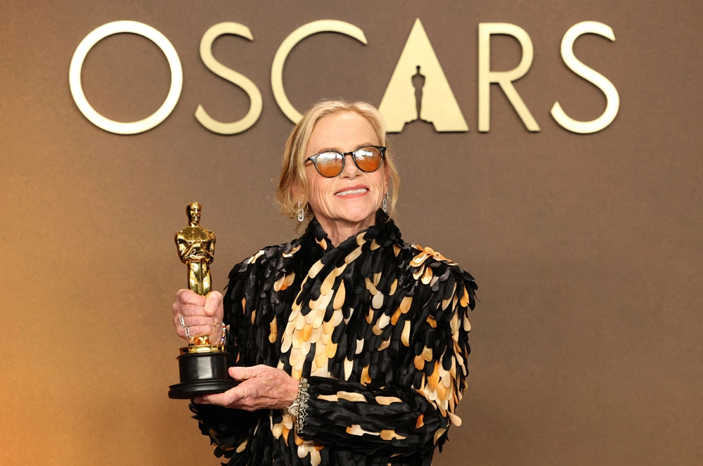 Эми Мэдиган.