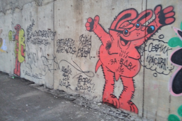 Этого красноярского героя зовут Псина. В городе он есть почти на каждой бесхозной стене.