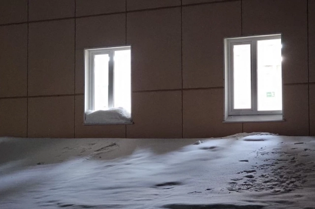 Свет в окнах Усинска во время ночной молитвы.