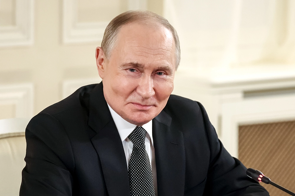 Владимир Путин на встрече с руководителями международных информационных агентств в Санкт-Петербурге.