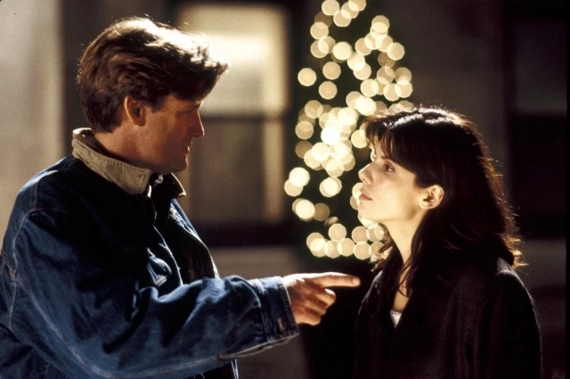 Сандра Буллок и Билл Пуллман. Фото: кадр из фильма «Пока ты спал»