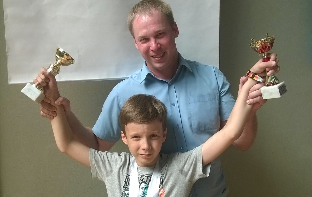 Юный чемпион и его тренер Алексей Шонин.