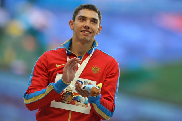 Александр Меньков, завоевавший золотую медаль в прыжках в длину на Чемпионате мира по лёгкой атлетике в Москве. 2013 год