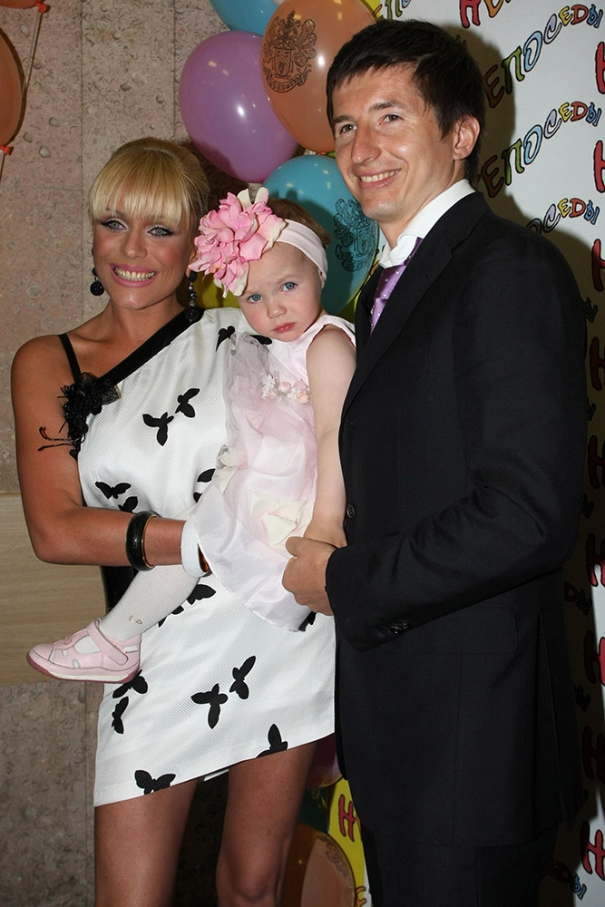 Евгений Алдонин c Юлией Началовой и дочерью Верой.