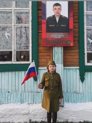 В родном селе Михаила Аксючица Поймо-Тины установлена памятная доска в память о его подвиге.