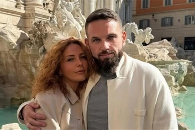 Роман Новак с женой.