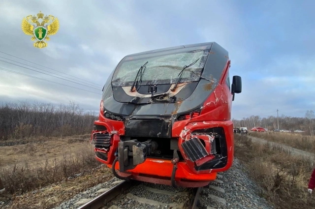 Электричка, которая столкнулась с мусоровозом.