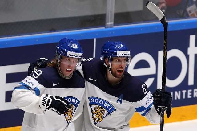 Сборная России по хоккею - Патрик Лайне (слева) и Микко Койву.