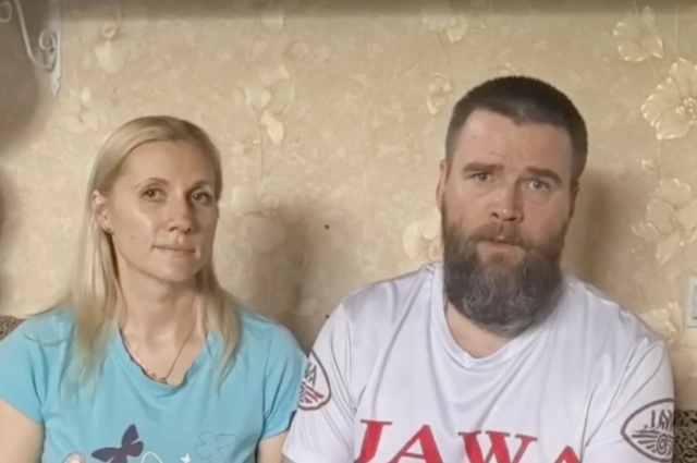 Пострадавшая женщина с мужем.
