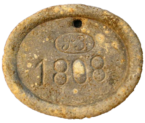 «Табельная марка» - личный жетон рабочего Радицкого завода, предъявляемый им при входе. Был такой и у Василия Савоничева».