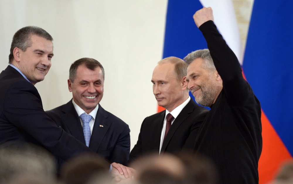 18 марта 2014 года. Владимир Путин в Кремле во время церемонии подписания договора о воссоединении Крыма и Севастополя с Россией.