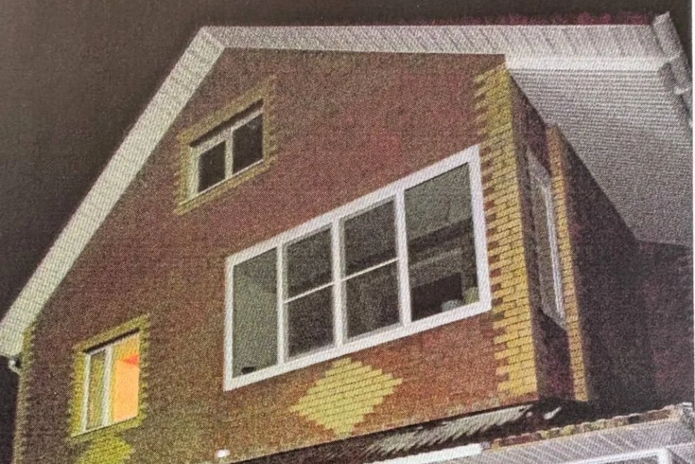 Дом, где произошло убийство.