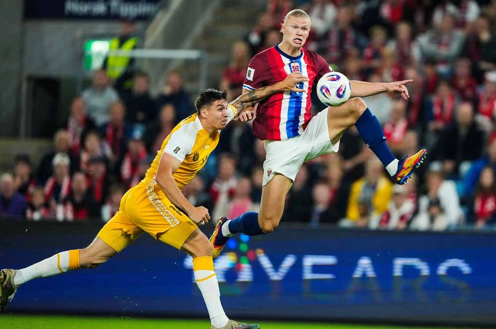 Эрлинг Хааланд из Норвегии и Артур Крачун из Молдовы.