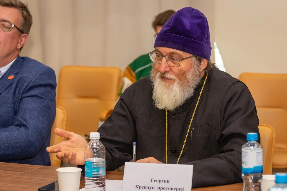 Отец Георгий.