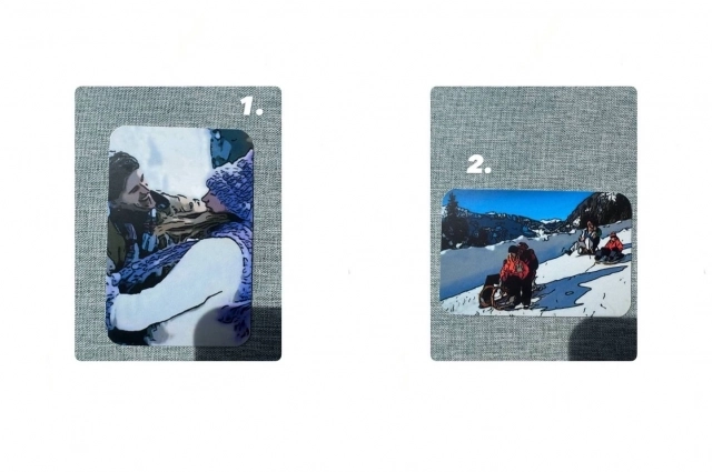 На картах - счастливые мужчина и женщины, снег, горы, ребенок.