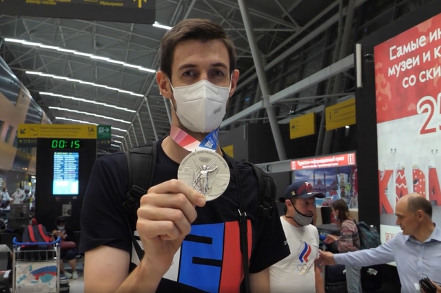 Артем Вольвич с медалью Олимпийских игр.