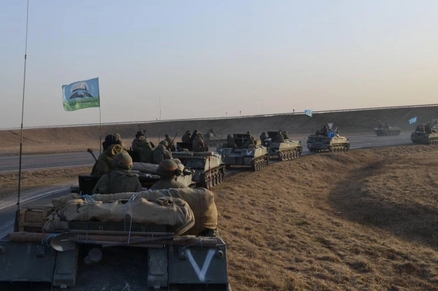 Выполняя поставленные задачи.
