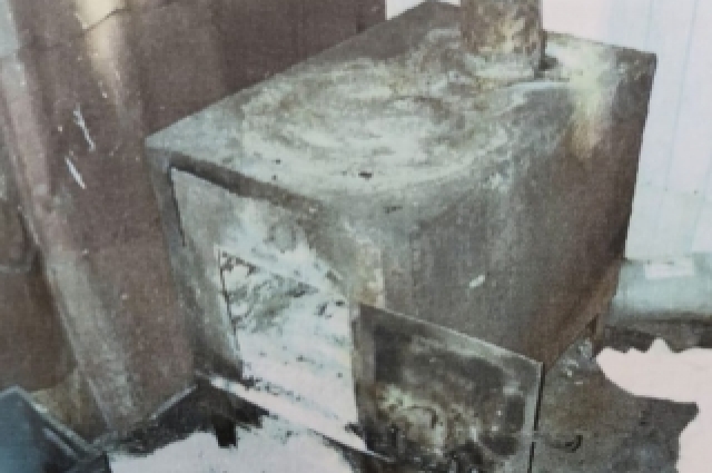 Печь, в которой сожгли личные вещи погибшей.